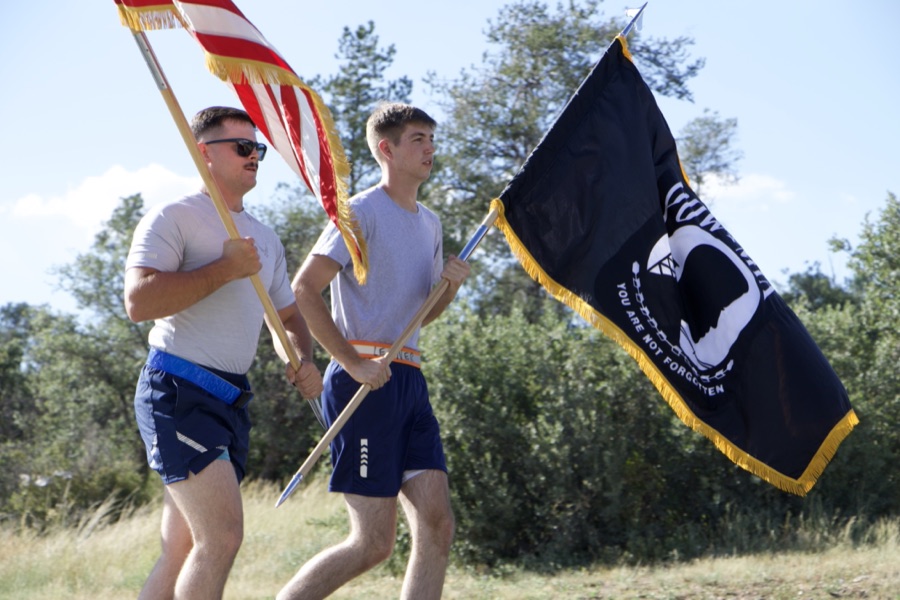 Carrying the American and POW/MIA flags during a Detachment 028 run